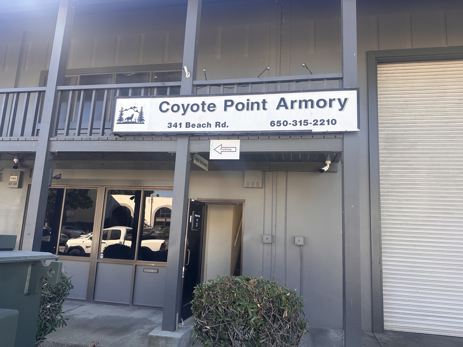 Coyote Point Armory storefront sign and entrance at 341 Beach Road